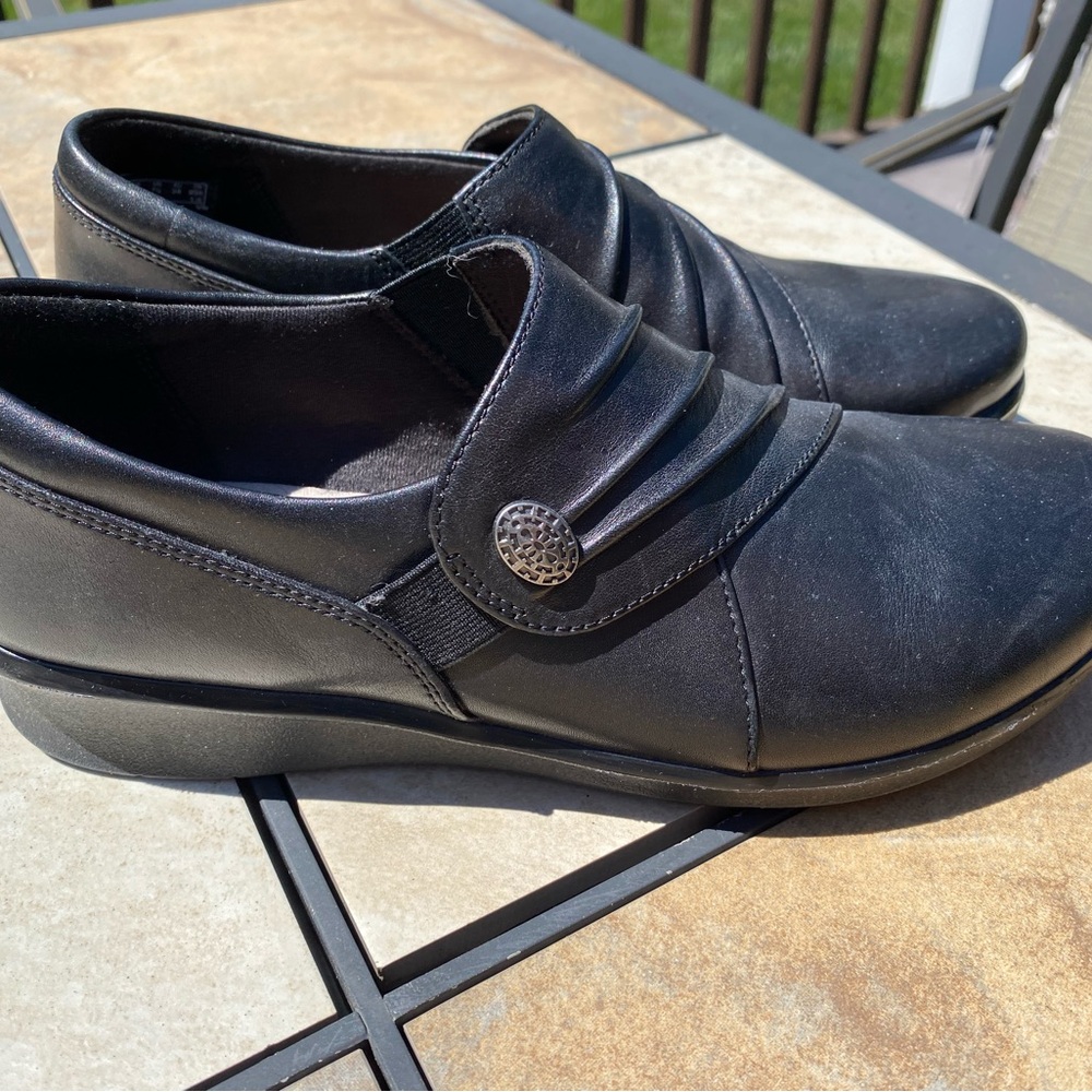 Clarks Black Slip-On Loafers with Strap Detail